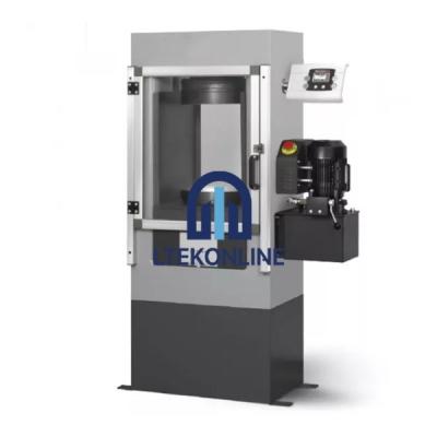 Automatic Compression Testers for Cubes and Cylinders